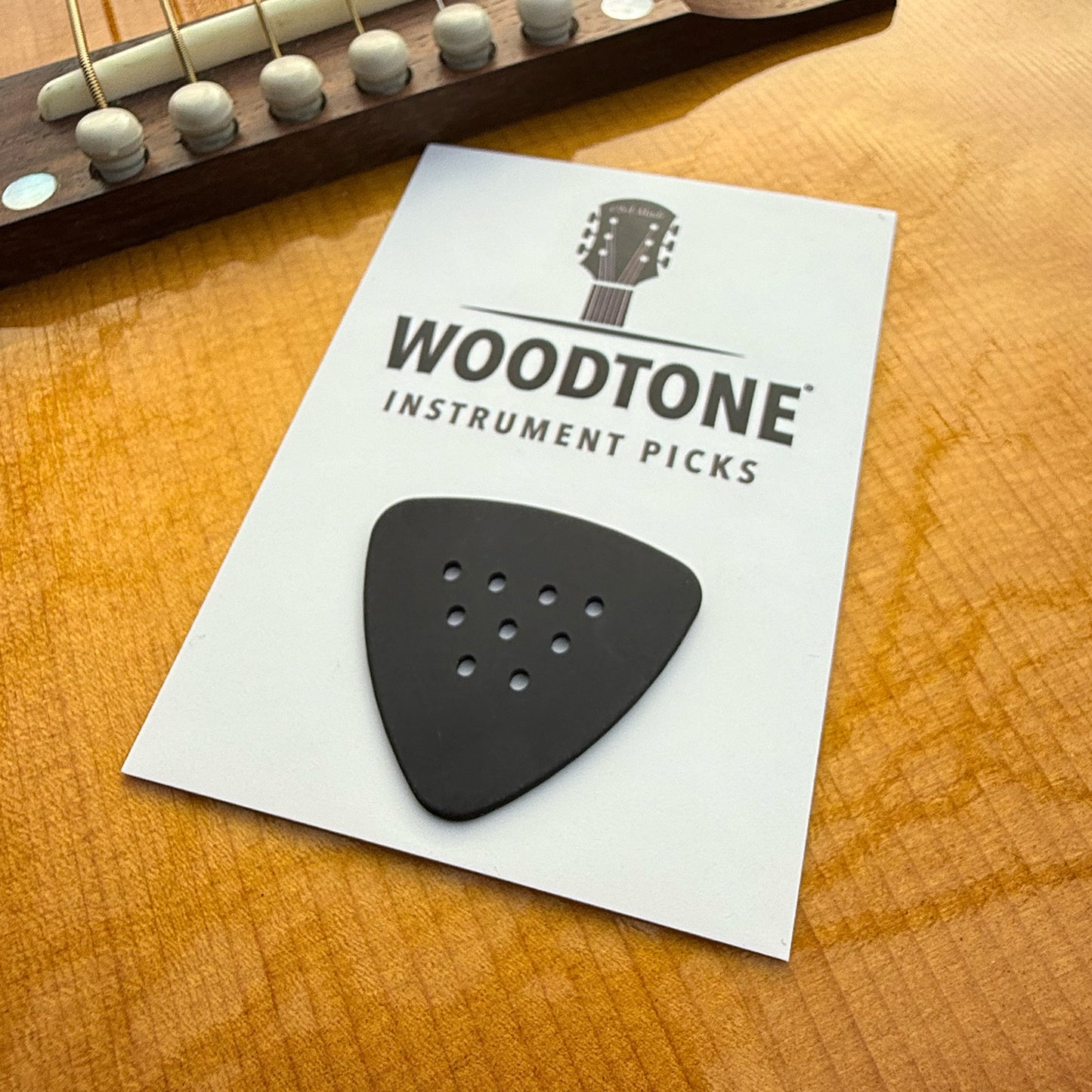 1.2mm-woodtone-triangle-bluegrass-guitar-pick-1